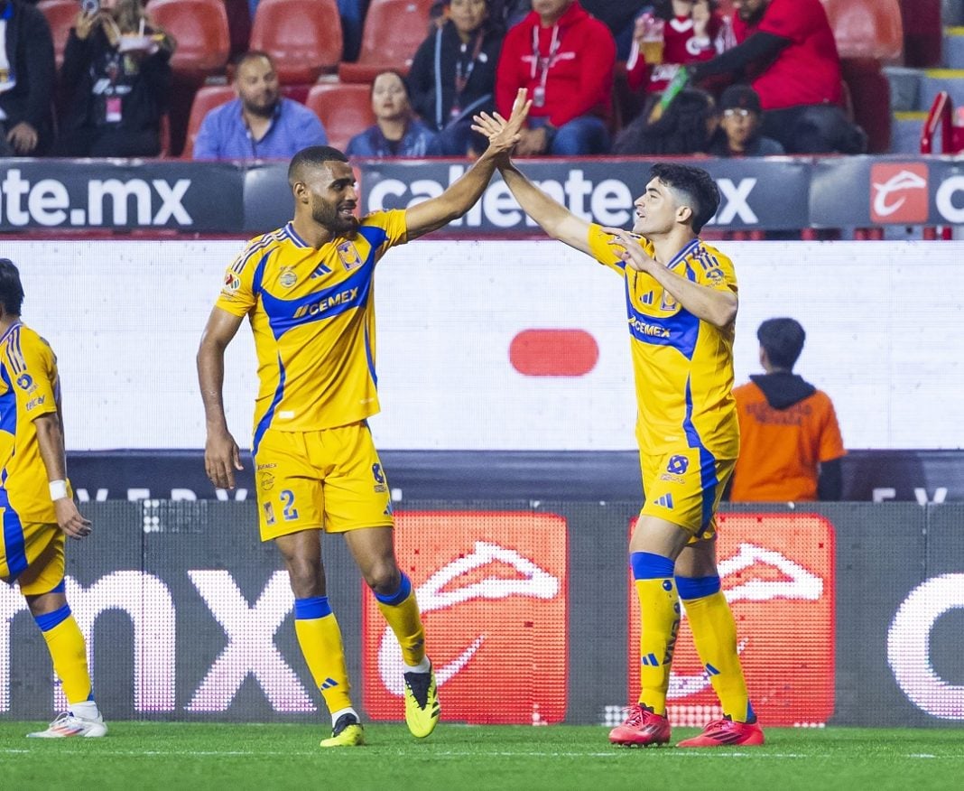 tigres celebrando una victoria